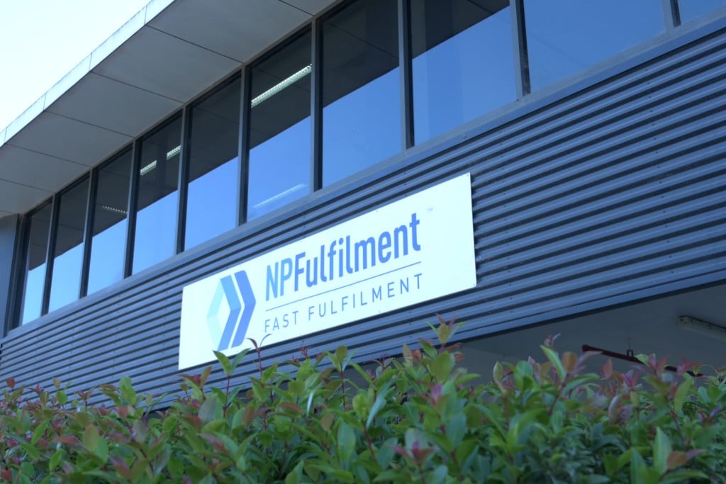 NPFulfilment fast fulfilment sign on a modern office building.